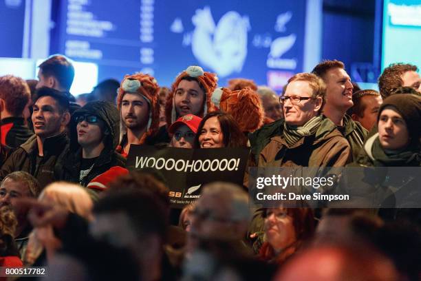 New Zealand All Black fans at the Queens Wharf Auckland Fan Zone watch the Rugby Test match between the New Zealand All Blacks and the British &...