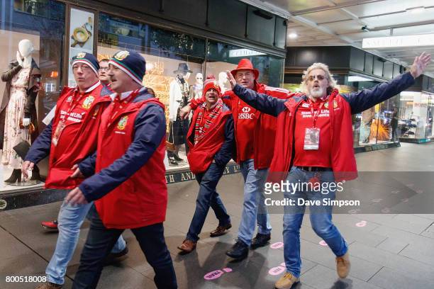 British & Irish Lions fans walk the Fan Trail to Eden Park to watch the Rugby Test match between the New Zealand All Blacks and the British & Irish...