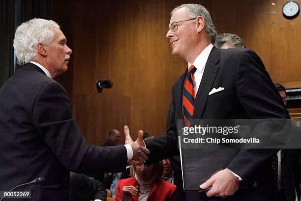 Agriculture Secretary Ed Schafer greets American Meat Institute Foundation President and CEO Patrick Boyle after testifying before the Senate...