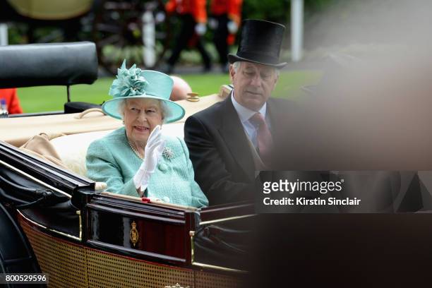 Queen Elizabeth II and Captain David Bowes-Lyon arrive in the Royal Procession on day 4 of Royal Ascot at Ascot Racecourse on June 23, 2017 in Ascot,...