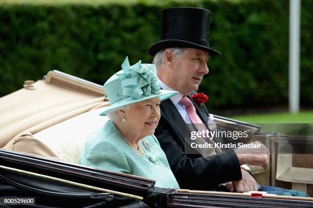 Queen Elizabeth II and Captain David Bowes-Lyon arrive in the Royal Procession on day 4 of Royal Ascot at Ascot Racecourse on June 23, 2017 in Ascot,...