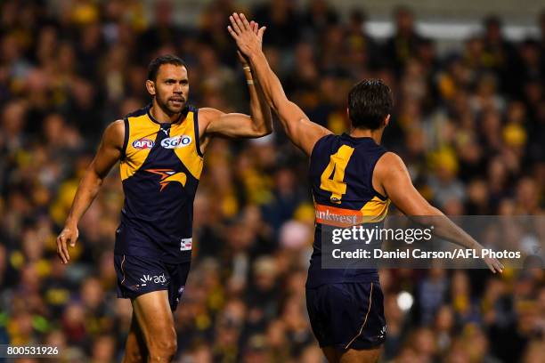 Josh Hill and Dom Sheed of the Eagles celebrates a goal during the 2017 AFL round 14 match between the West Coast Eagles and the Melbourne Demons at...