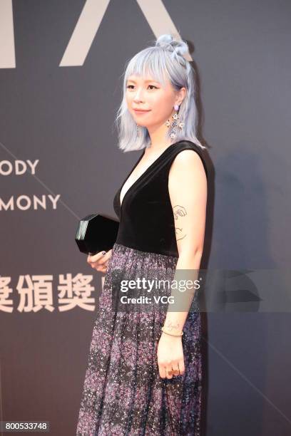 Singer Huang Jieyu arrives at the red carpet of the 28th Golden Melody Awards Ceremony on June 24, 2017 in Taipei, Taiwan of China.