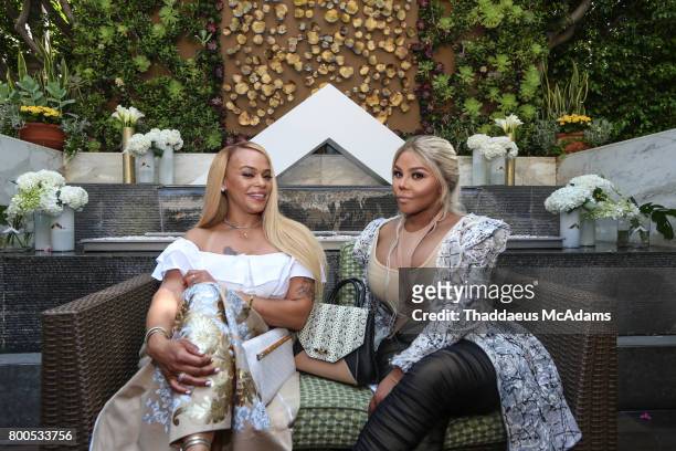 Faith Evans and Lil Kim at Four Seasons Hotel Los Angeles at Beverly Hills on June 23, 2017 in Los Angeles, California.