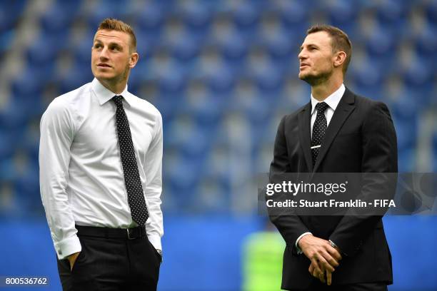 Tommy Smith and Chris Wood of New Zealand walk on the pitch prior to during the FIFA Confederations Cup Russia 2017 Group A match between New Zealand...