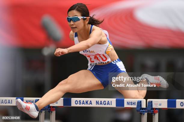 Ayako Kimura of Japan in the Women's 100m hurdles heat 2 during the 101st Japan National Championships at Yanmar Stadium Nagai on June 24, 2017 in...