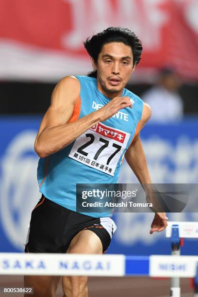 Takatoshi Abe of Japan competes in the Men's 400m hurdles final during the 101st Japan National Championships at Yanmar Stadium Nagai on June 24,...