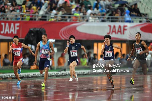 Takumi Kuki, Aska Cambridge, Yoshihide Kiryu, Syuhei Tada and Abdul Hakim Sani Brown of Japan compete in the Men 100m final during the 101st Japan...