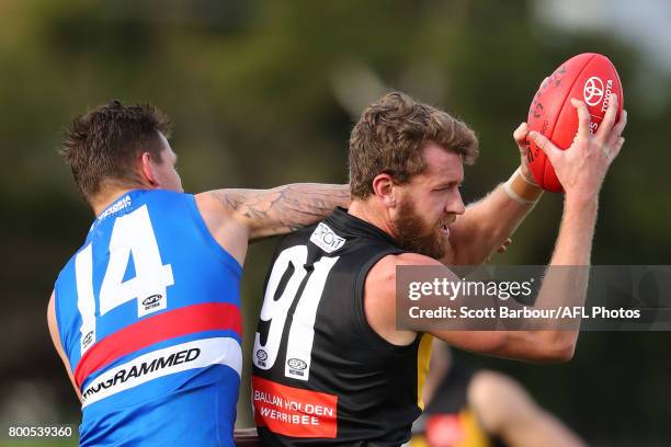 Lachlan Hansen of Werribee competes for the ball during the 2017 VFL round 10 match between the Footscray Bulldogs and the Werribee Tigers at Whitten...