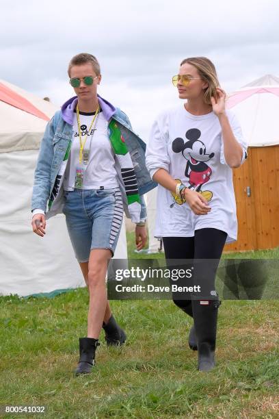 Cara Delevingne and Margot Robbie attend day two of Glastonbury on June 24, 2017 in Glastonbury, England.