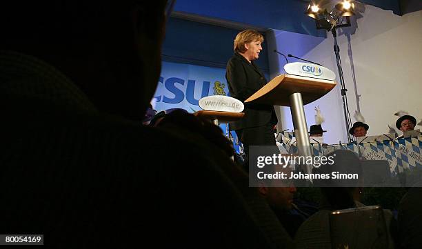 German Chancellor Angela Merkel delivers a speech during a CSU party rally in the Augustiner beer cellar on February 28, 2008 in Munich, Germany. The...