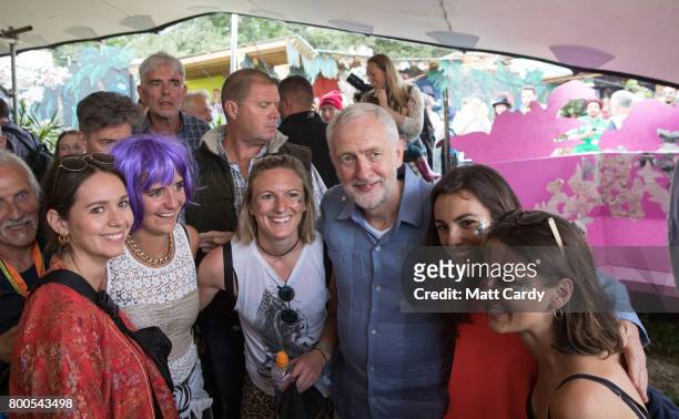 Labour Party leader Jeremy Corbyn meets festival goers as he visits the Green Fields at the Glastonbury Festival site at Worthy Farm in Pilton on...