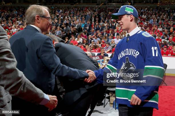 Kole Lind meets with Vancouver Canucks executives after being selected 33rd overall during the 2017 NHL Draft at the United Center on June 24, 2017...