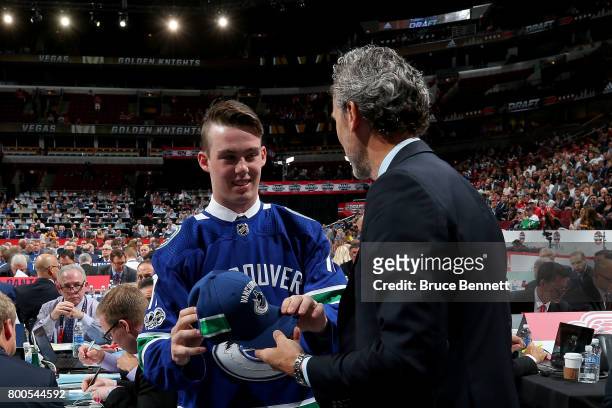 Kole Lind meets with Vancouver Canucks executives after being selected 33rd overall during the 2017 NHL Draft at the United Center on June 24, 2017...