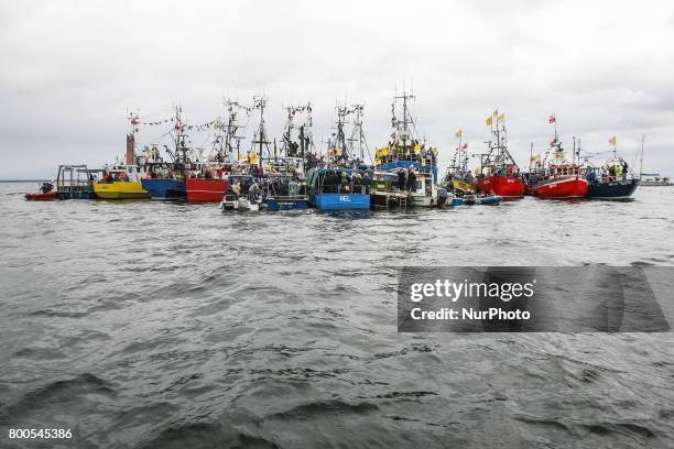 Fishing boats are seen during the annual Kashubian fishermen sea pilgrimage in Puck, Poland on 24 June 2017 Every year fishermen from Kashubia region...