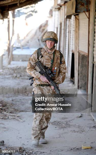 Prince Harry patrols through the deserted town of Garmisir on January 2, 2008 in Helmand Province, Afghanistan.