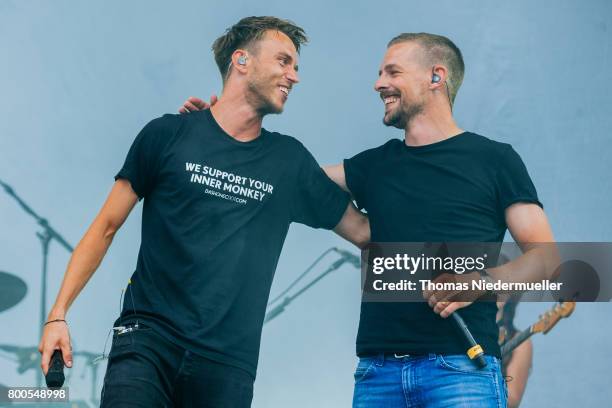 Clueso performs with TV host Klaas Heufer-Umlauf during the second day of the Southside festival on June 24, 2017 in Neuhausen, Germany.