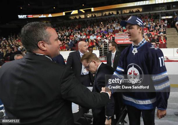 Dylan Samberg greets the team after being selected 43rd overall by the Winnipeg Jets during the 2017 NHL Draft at United Center on June 24, 2017 in...