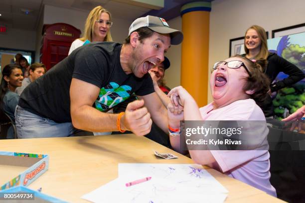 Paul Rudd meets with a patient at Children's Mercy Hospital during the Big Slick Celebrity Weekend benefiting Children's Mercy Hospital of Kansas...