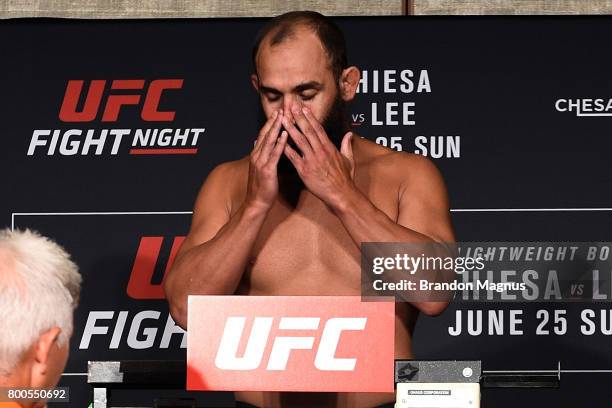 Johny Hendricks reacts to his weight on the scale during the UFC Fight Night weigh-in on June 24, 2017 in Oklahoma City, Oklahoma.