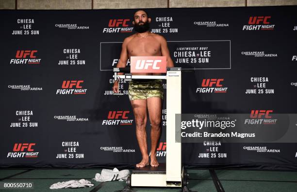 Johny Hendricks poses on the scale during the UFC Fight Night weigh-in on June 24, 2017 in Oklahoma City, Oklahoma.