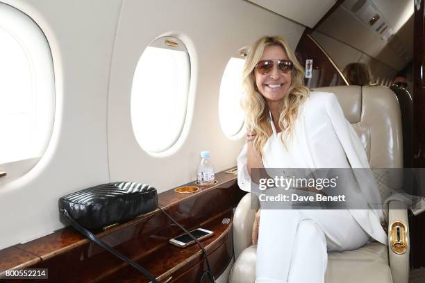 Melissa Odabash arrives via private jet Falcon 2000 from Gama Aviation ahead of the Jersey Style Awards 2017 in association with Chopard on June 24,...
