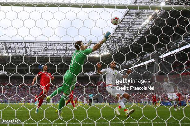 Nestor Araujo of Mexico scores his sides first goal past Igor Akinfeev of Russia during the FIFA Confederations Cup Russia 2017 Group A match between...