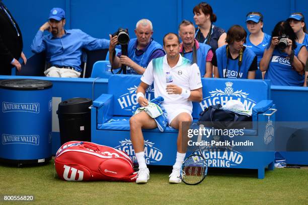 Gilles Muller of Luxemburg takes a drink during the Semi Final match against Marin Cilic of Croatia on day six at Queens Club on June 24, 2017 in...