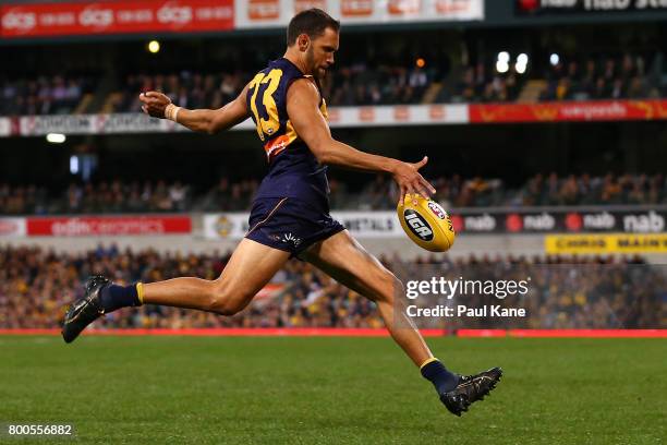 Josh Hill of the Eagles kicks on goal during the round 14 AFL match between the West Coast Eagles and the Melbourne Demons at Domain Stadium on June...