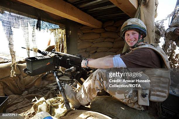 Prince Harry mans a 50mm machine gun aimed at Taliban fighters on January 2, 2008 in Helmand Province, Afghanistan.
