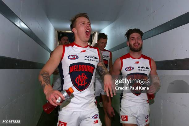 James Harmes of the Demons walks down the race after winning the round 14 AFL match between the West Coast Eagles and the Melbourne Demons at Domain...