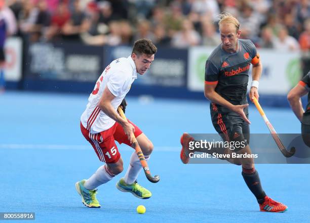 Phil Roper of England runs with the ball during the semi-final match between England and the Netherlands on day eight of the Hero Hockey World League...