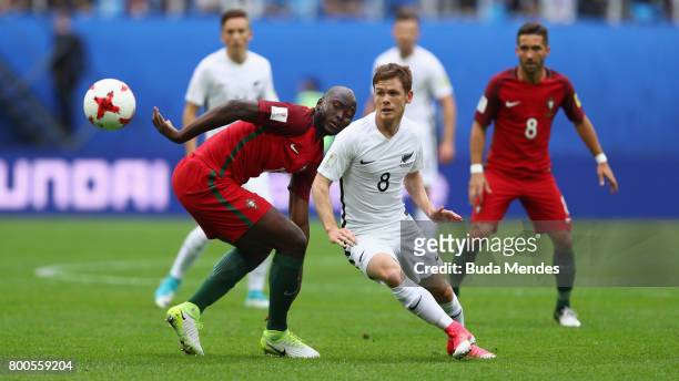 Michael McGlinchey of New Zealnd takes the ball past Danilo of Portugal during the FIFA Confederations Cup Russia 2017 Group A match between New...