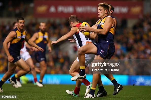 Brad Sheppard of the Eagles marks the ball during the round 14 AFL match between the West Coast Eagles and the Melbourne Demons at Domain Stadium on...