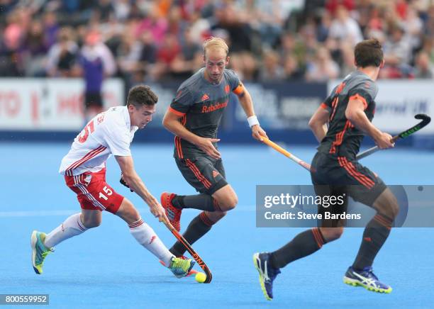 Phil Roper of England breaks away from Billy Bakker of the Netherlands during the semi-final match between England and the Netherlands on day eight...