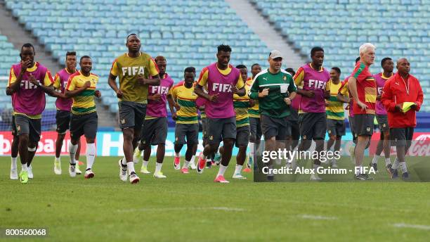 Players run during a Cameroon training session at Fisht Olympic Stadium ahead of their FIFA Confederations Cup Russia 2017 Group B match against...