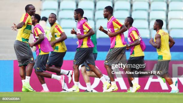 Players run during a Cameroon training session at Fisht Olympic Stadium ahead of their FIFA Confederations Cup Russia 2017 Group B match against...