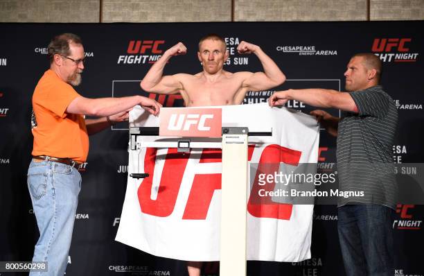 Dennis Siver of Germany poses on the scale during the UFC Fight Night weigh-in on June 24, 2017 in Oklahoma City, Oklahoma.