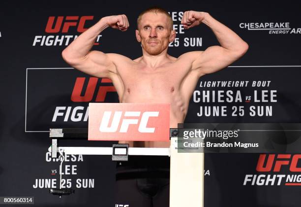 Dennis Siver of Germany poses on the scale during the UFC Fight Night weigh-in on June 24, 2017 in Oklahoma City, Oklahoma.