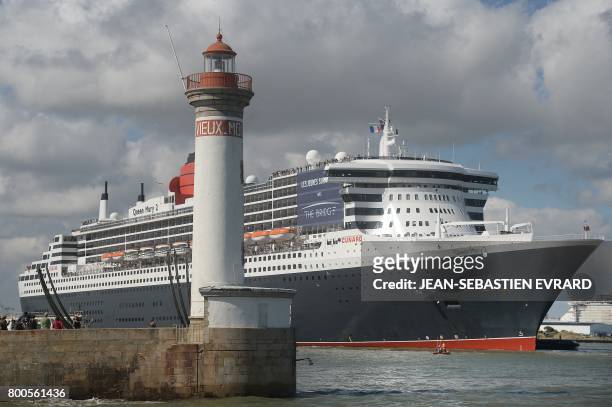British cruise ship Queen Mary 2 arrives in Saint-Nazaire, western France on June 24 on the eve of the start of The Bridge 2017, a transatlantic race...