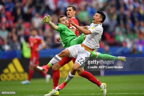 Russia's goalkeeper Igor Akinfeev misses a goal by Mexico's forward Hirving Lozano uring the 2017 Confederations Cup group A football match between...
