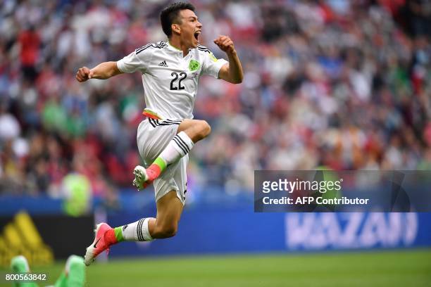 Mexico's forward Hirving Lozano celebrates after scoring the team's second goal during the 2017 Confederations Cup group A football match between...