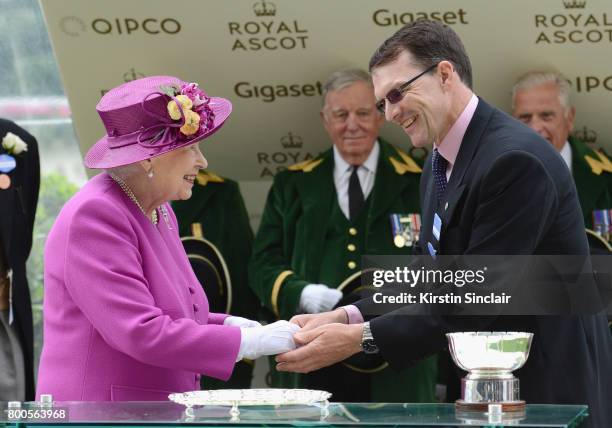 Queen Elizabeth II and trainer Aidan O'Brien on day 5 of Royal Ascot 2017 at Ascot Racecourse on June 24, 2017 in Ascot, England.