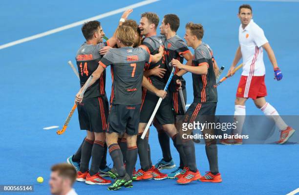 Mirco Pruijser of the Netherlands celebrates scoring their teams first goal with teammates during the semi-final match between England and the...