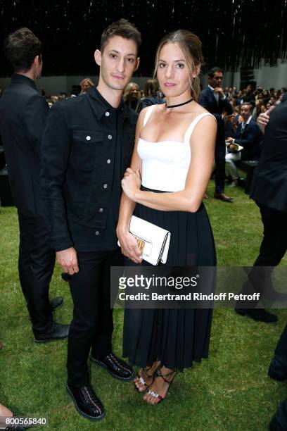 Pierre Niney and Natasha Andrews attend the Dior Homme Menswear Spring/Summer 2018 show as part of Paris Fashion Week on June 24, 2017 in Paris,...