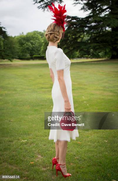 Tatiana Korsakova wearing a Dolce & Gabbana dress, Arturo Rios Hat, BUwood bag and Christian Louboutin shoes For Royal Ascot on June 24, 2017 in...