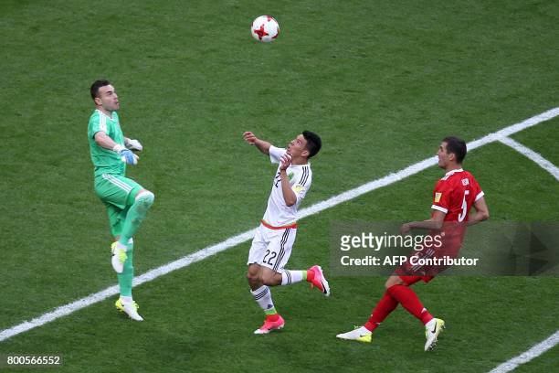 Mexico's forward Hirving Lozano shoots to score the team's second goal during the 2017 Confederations Cup group A football match between Mexico and...
