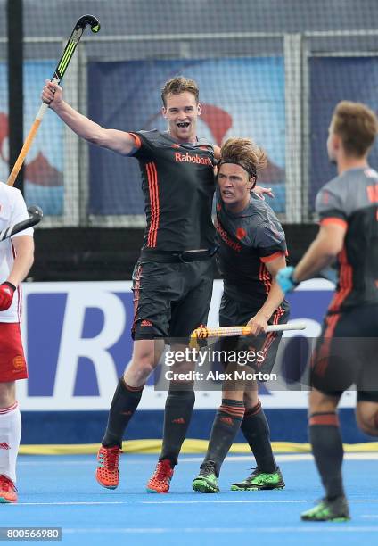 Mirco Pruijser of the Netherlands celebrates scoring their teams first goal with teammates during the semi-final match between England and the...