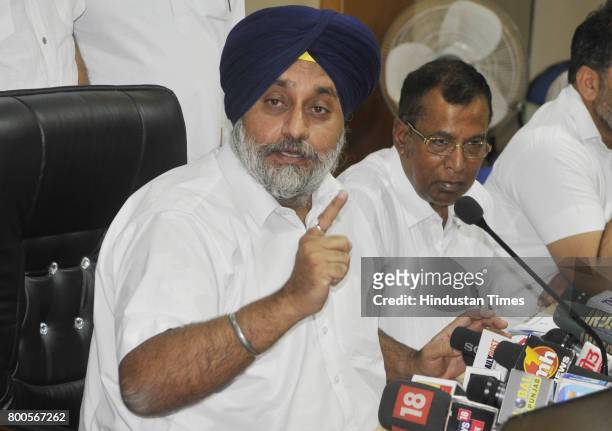 President Sukhbir Badal addressing a press conference, demanding action against the Speaker for ordering the use of force against MLAs, the tossing...