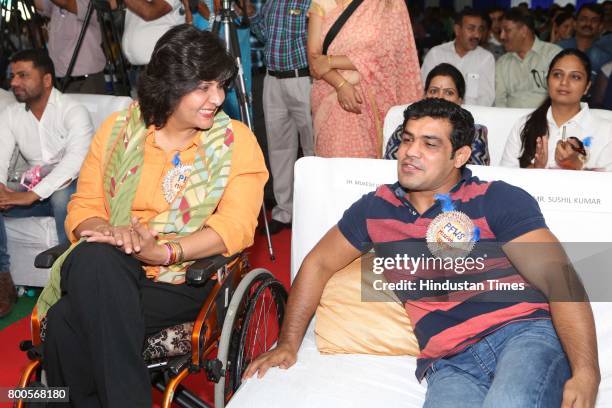 Wrestler Sushil Kumar and paralympian Deepa Malik during the launch of Neele Pankh, an initiative by Police Families Welfare Society to make sports a...